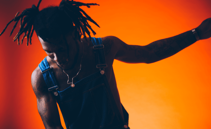 Slow-whine with Burna Boy and J Hus on “Sekkle Down”