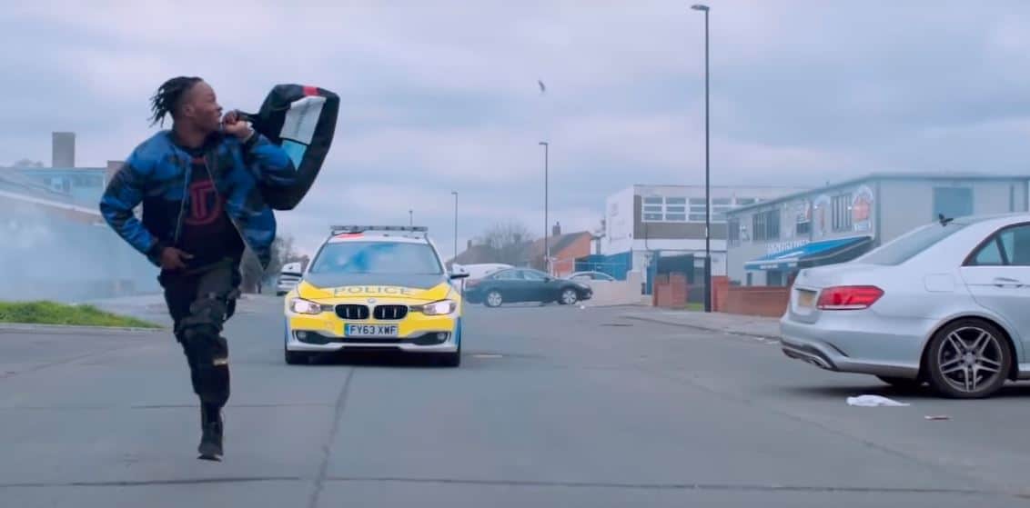 Naira Marley gets in a goofy chase with the cops in his music video for “Japa”