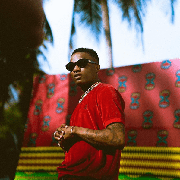 See the reactions to Wizkid and Tiwa Savage snuggling up in “Fever” video
